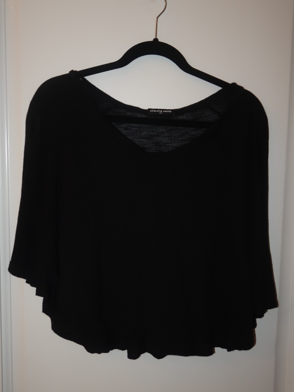 sheer black poncho top